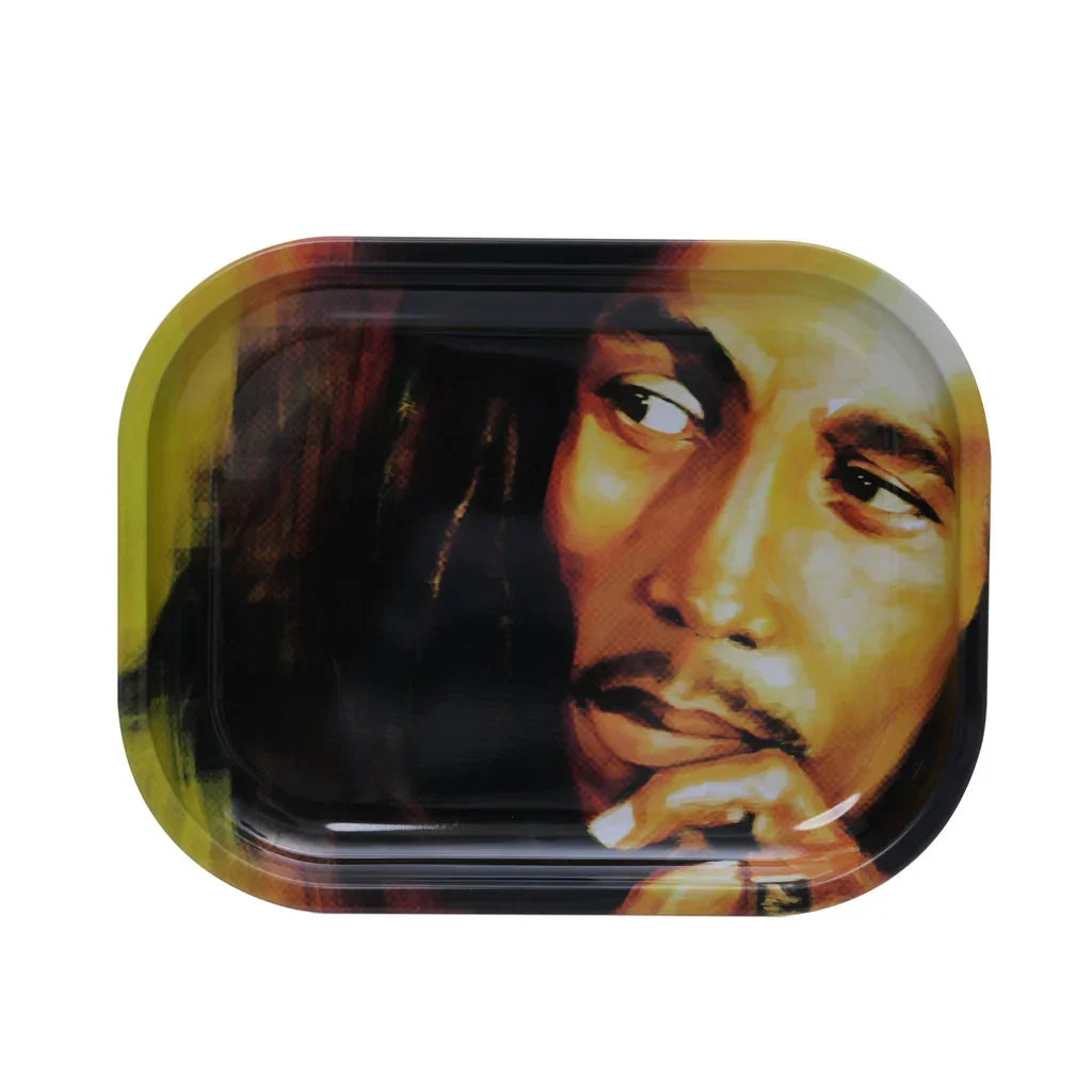 Rectangular rolling tray with colorful close-up portrait of a man with thoughtful expression, ring on finger