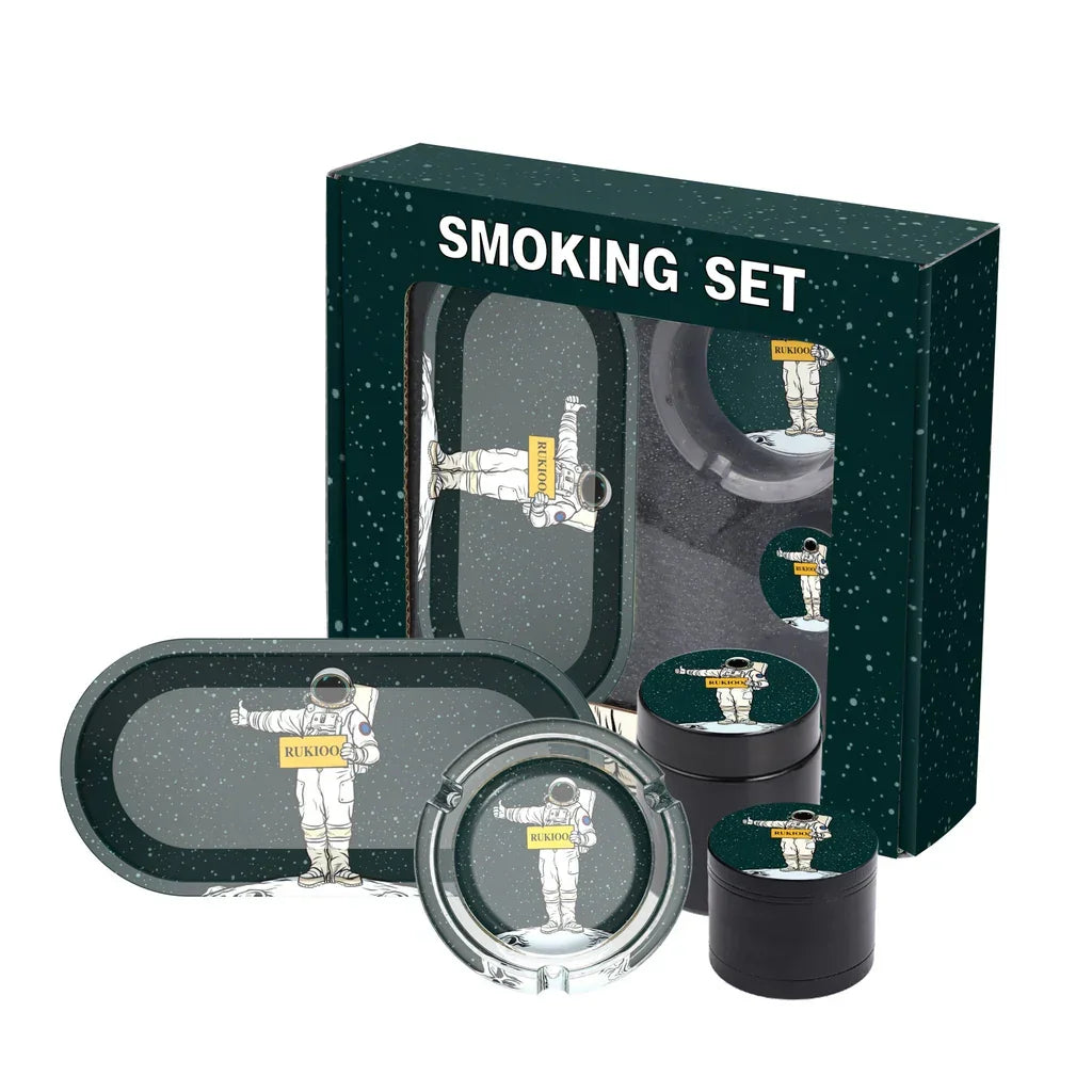 Space-themed smoking set with astronaut and starry background including ashtray and grinder