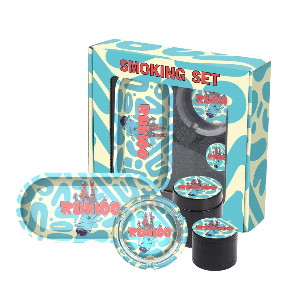 Colorful smoking set with ashtray, rolling tray, and grinders featuring Rukio design