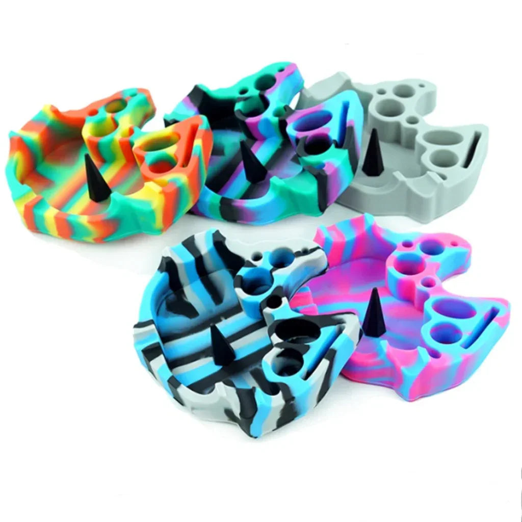 Colorful silicone ashtrays with black cone-shaped holders, featuring multi-hole designs on white background