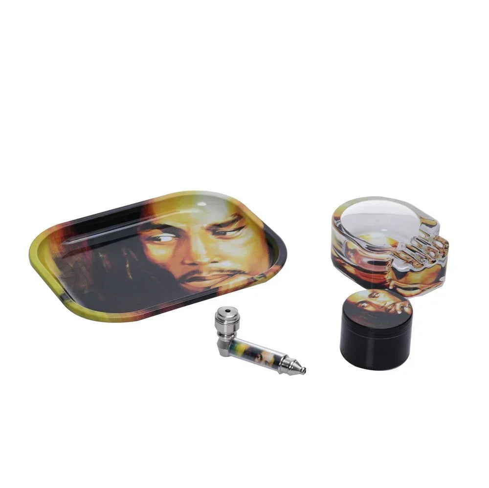 Bob Marley rolling tray, glass skull ashtray, grinder, and metal pipe smoking accessories