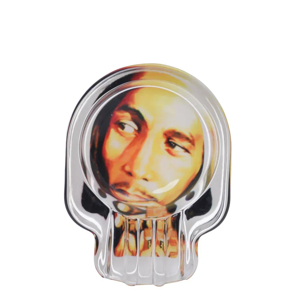 Clear glass ashtray with portrait of a man with a contemplative expression inside