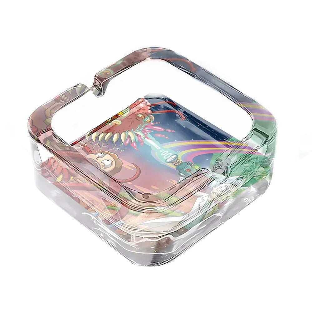 Clear glass ashtray featuring colorful cartoon design of characters and monsters