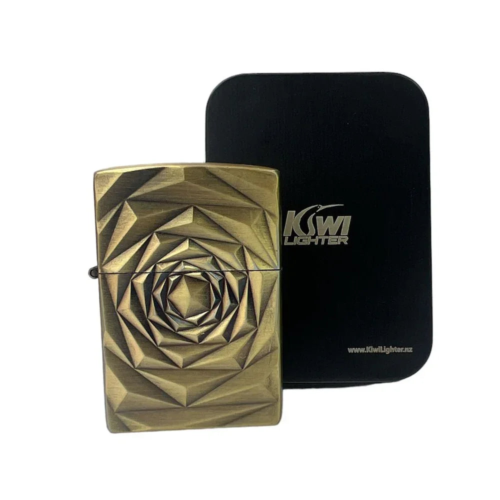 Bronze geometric patterned metal lighter with black Kiwi Lighter branded tin case