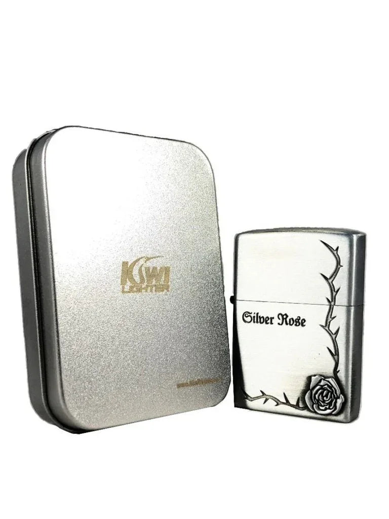 Silver metal cigarette lighter with 'Silver Rose' text and rose design, next to silver Kiwi lighter case