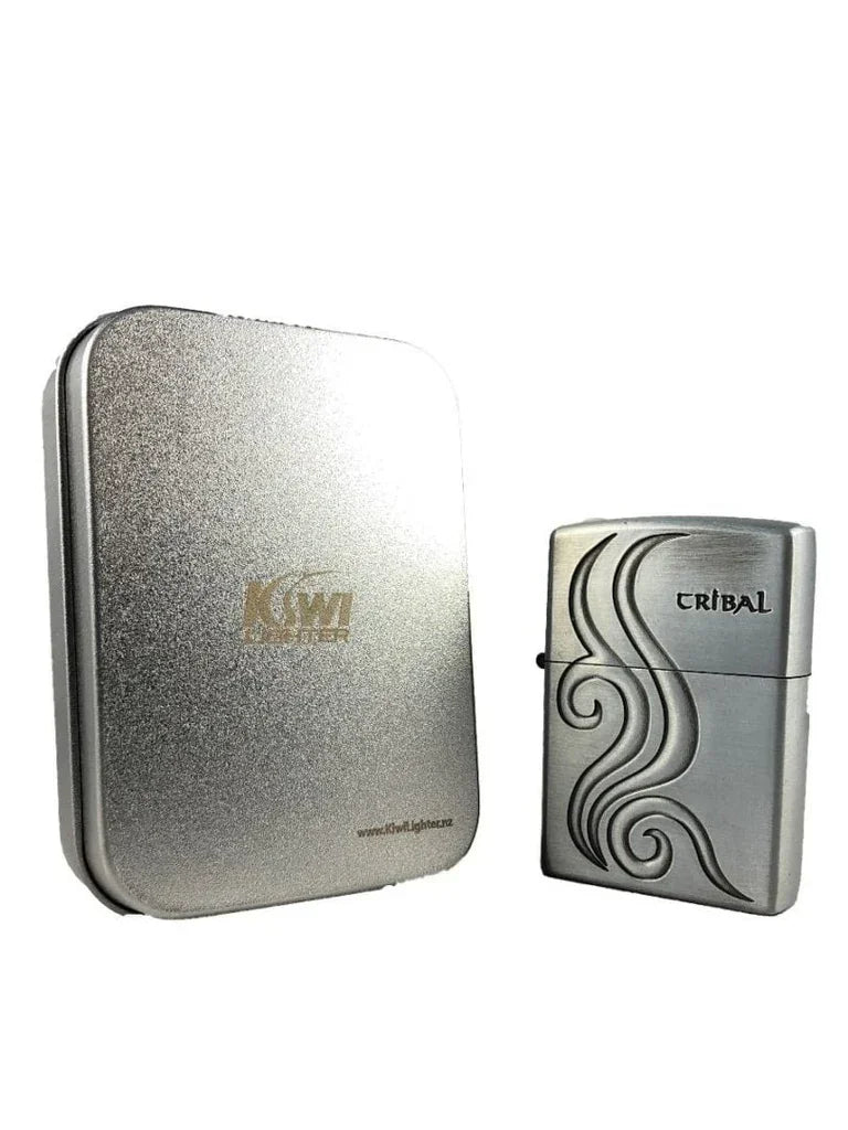 Silver metal tribal design lighter next to silver KSWI branded metal storage tin