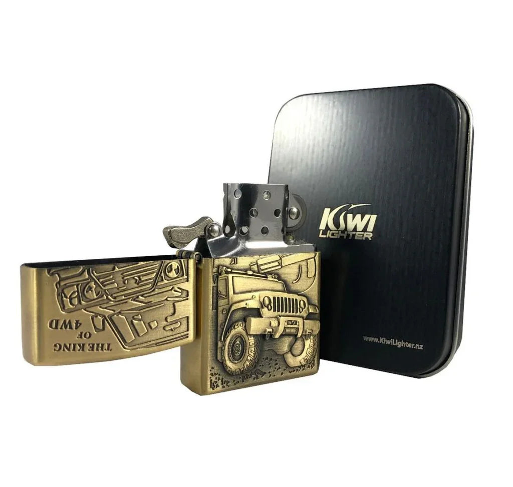 Antique brass flint lighter featuring embossed military jeep design and 'The King of 4WD' text with black Kiwi Lighter case