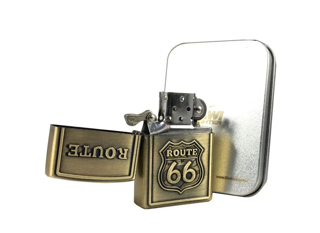 Open vintage brass Route 66 flint lighter with metal case on white background