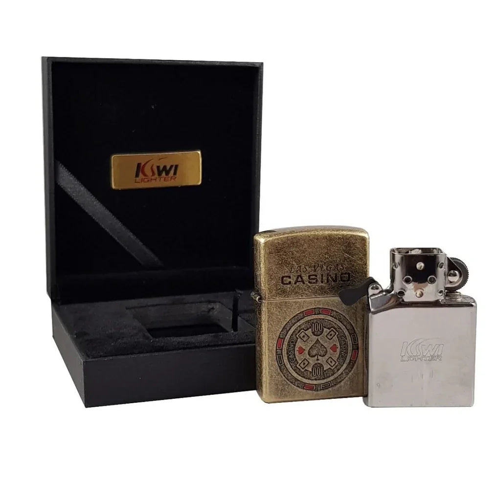 Open black case with Kiwi lighter logo, brass Las Vegas Casino poker chip design lighter, and silver Kiwi flint lighter