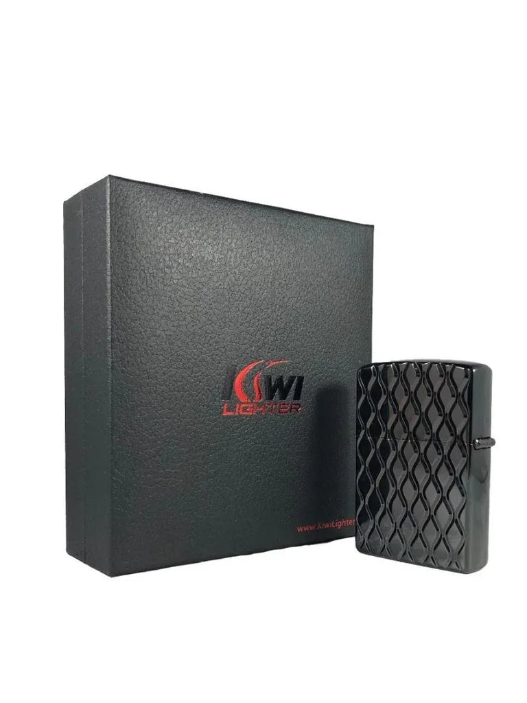 Black patterned metal lighter next to a black textured JW Lighter box with red logo