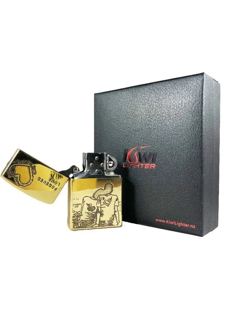 Gold-colored metal flint lighter with couple sketch and heart engraving, branded Kiwi Lighter box