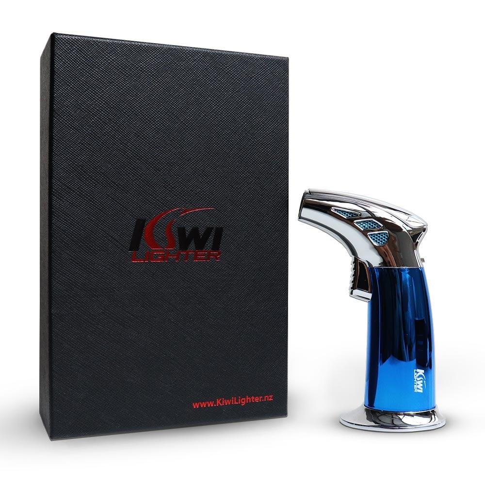 Blue and chrome KiwiLighter jet flame torch lighter with black textured box packaging