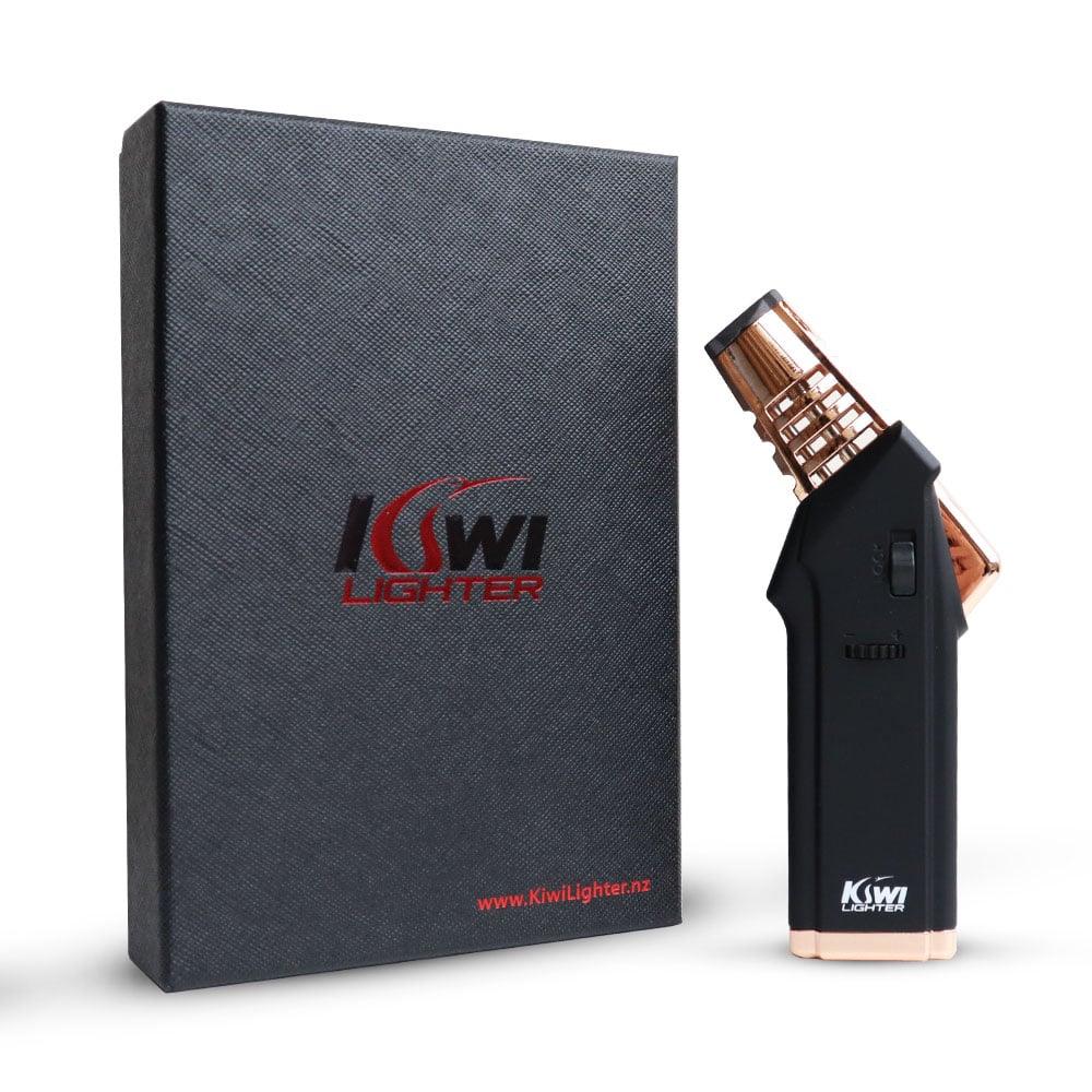 Black and rose gold Kiwi Lighter torch with textured black retail box featuring logo and website