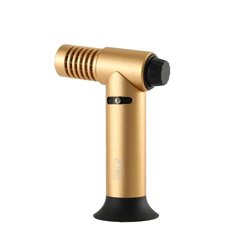 gold torch lighter with black base and knob isolated on white background