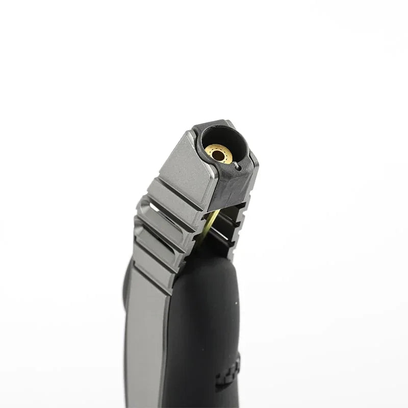 Close-up of a black and gray jet torch lighter with angled nozzle on white background