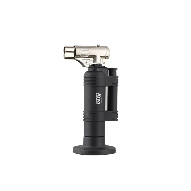 Black Kiva Torch jet lighter with silver metal nozzle and ergonomic grip on white background