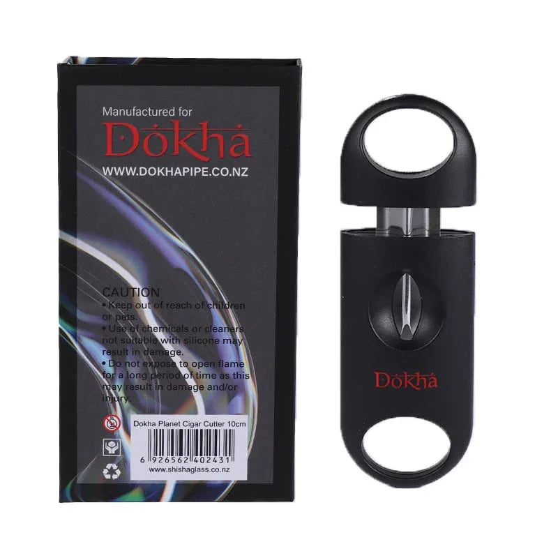 Dokha branded black stainless steel cigar cutter with packaging and safety caution label