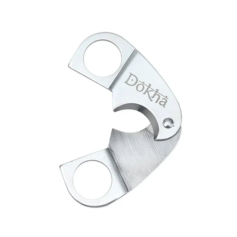 Silver Dokha cigar cutter with dual finger holes and sharp crescent blade