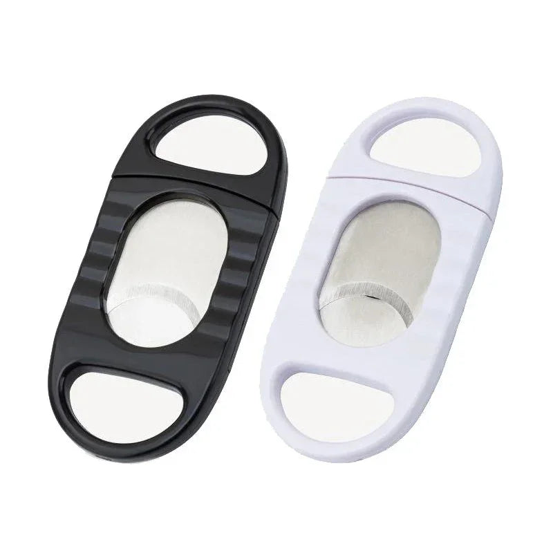 Black and white handheld double-blade cigar or cigarette cutter with ergonomic grips